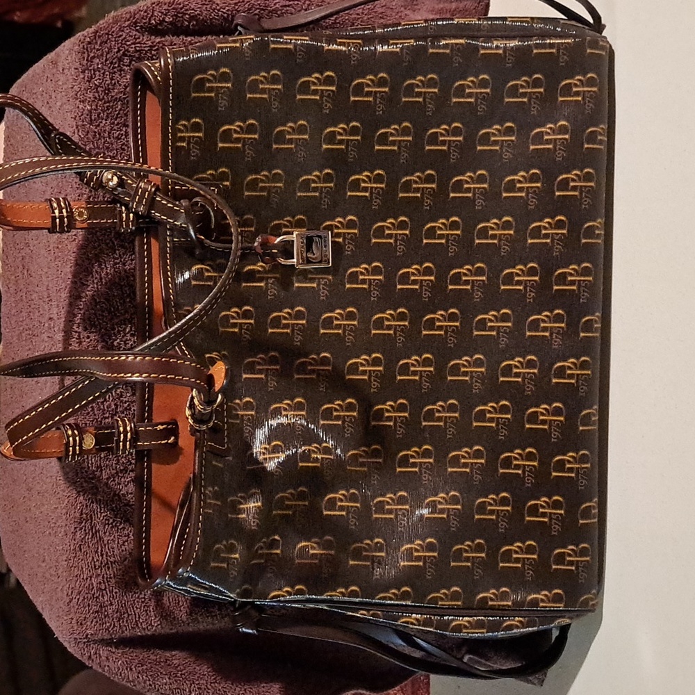 Dooney & Bourke coated canvas satchel.